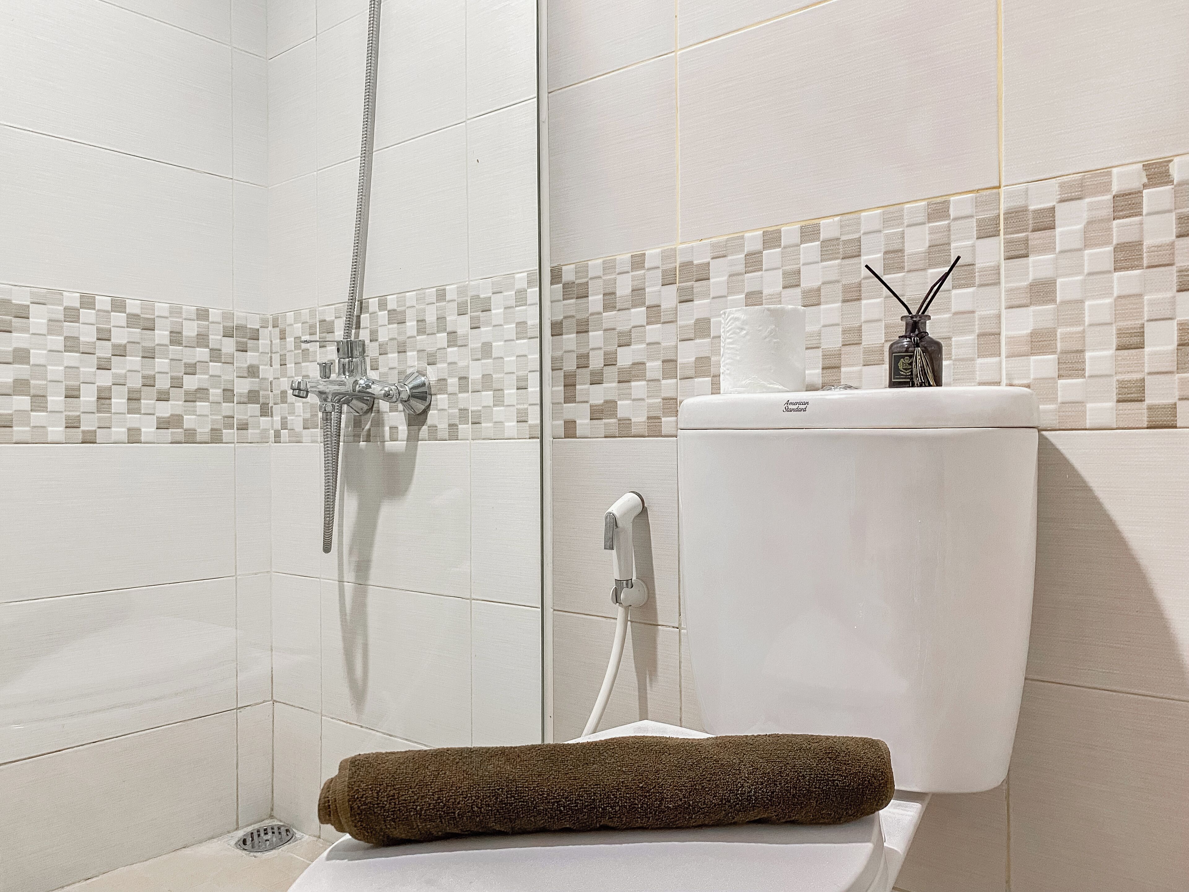 Estudio | Baño | Ducha y toallas