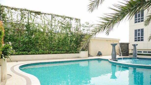 Outdoor pool - Modern Look 2Br At Lucky Tower Residence Apartment (Jakarta)