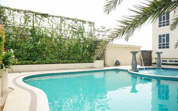 Outdoor pool - Modern Look 2Br At Lucky Tower Residence Apartment (Jakarta)