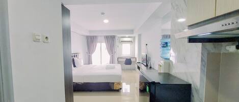 Monolocale | Cucina privata | Frigorifero, piano cottura, risottiera