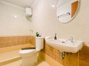 Studio | Bathroom | Shower, towels - Warm And Cozy Studio (No Kitchen) At Grand Palace Kemayoran Apartment (Jakarta)