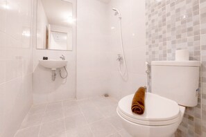 Apartamento | Banheiro | Chuveiro, toalhas de banho