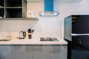 Apartment | Private kitchen | Fridge, stovetop, rice cooker, dining tables