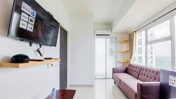 Apartamento Deluxe | Zona de estar