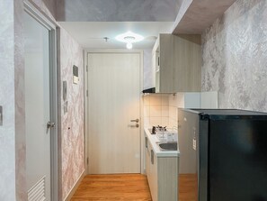 Estúdio | Cozinha privada | Geladeira, cooktop, panela elétrica de arroz