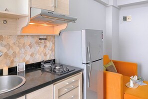 Appartement | Cuisine privée | Réfrigérateur, plaque de cuisson, cuiseur de riz