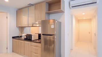 Apartemen | Dapur pribadi | Lemari es, microwave, kompor, dan penanak nasi