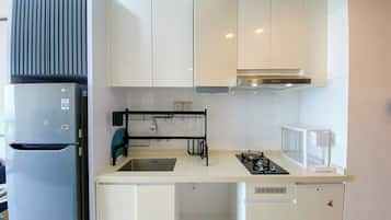 Apartment | Private kitchen | Fridge, stovetop, rice cooker, dining tables