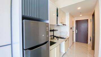 Apartment | Private kitchen | Fridge, stovetop, rice cooker, dining tables