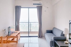Apartment | Living area - Best Place And Homey 2Br Sky House Bsd Apartment Near Aeon (Pagedangan)