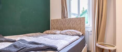 1 habitación y ropa de cama