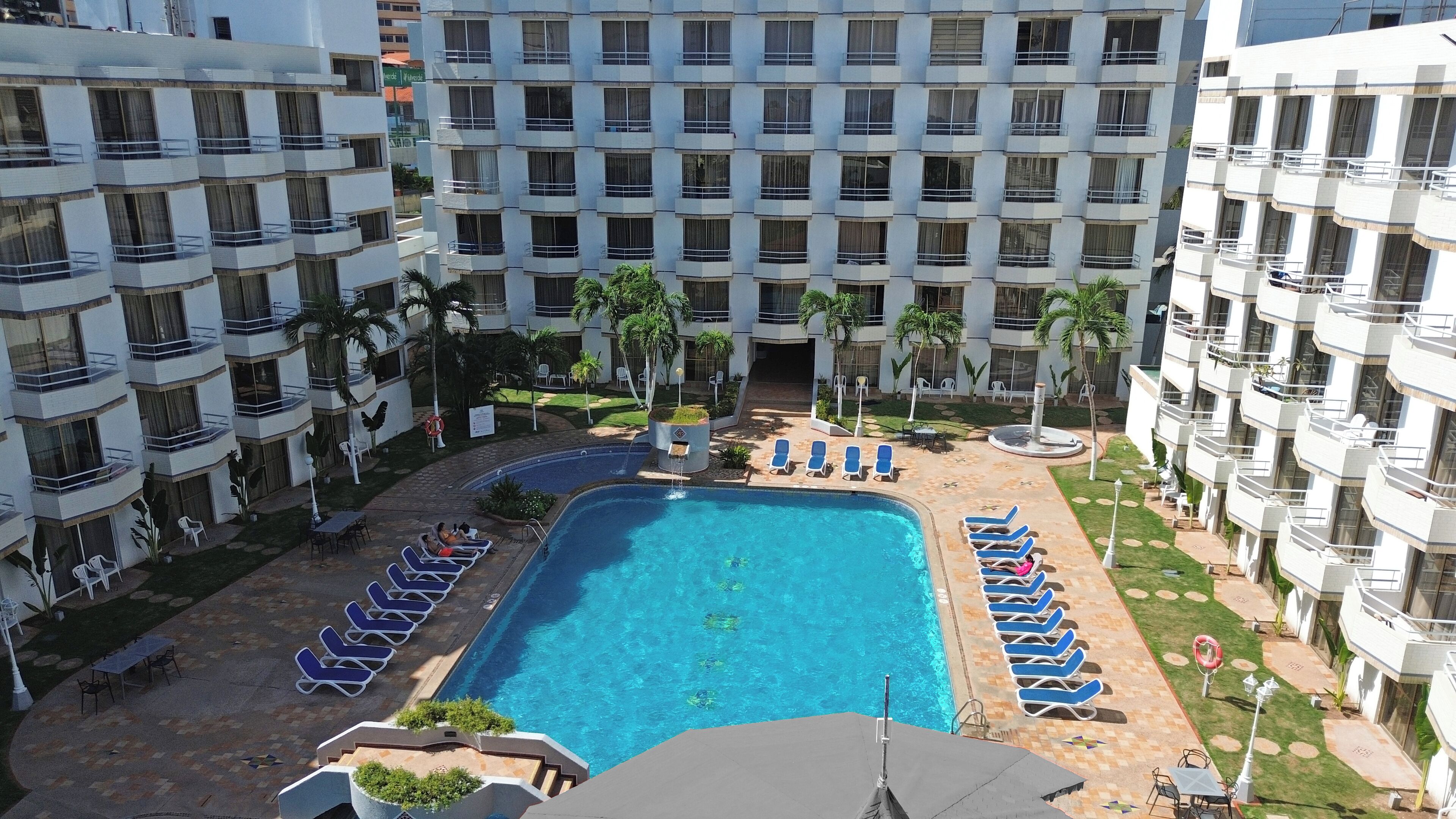 Standard Room, Balcony, Pool View | View from room