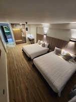 Executive Studio, 2 Double Beds, Balcony, Pool View | In-room safe, blackout drapes, soundproofing, iron/ironing board