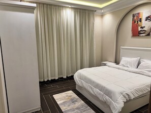 3 dormitorios, tabla de planchar con plancha, wifi gratis y ropa de cama