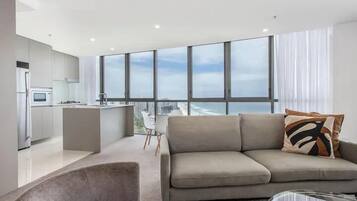 Apartment | Living area | 55-inch Smart TV with digital channels, Netflix, streaming services