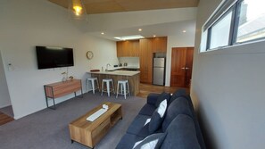 Smart TV - Sleek Suite by the Sand (1-bedroom) (Dunedin)