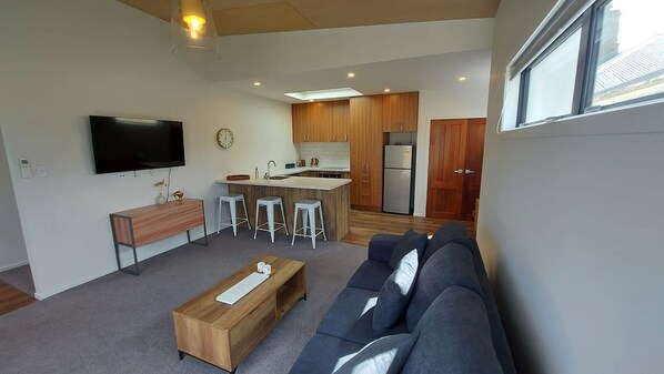 Smart TV - Sleek Suite by the Sand (1-bedroom) (Dunedin)