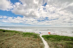 On the beach, sun loungers