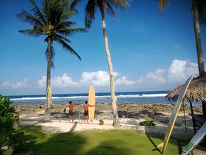On the beach, white sand, sun loungers, beach umbrellas - HELMINA'S VILLAS (General Luna)