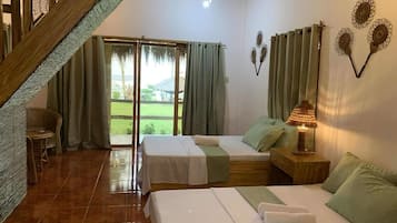 Phòng Tiêu chuẩn, nhiều giường, quang cảnh biển, đối diện biển | 2 phòng ngủ, khu vực làm việc phù hợp cho laptop