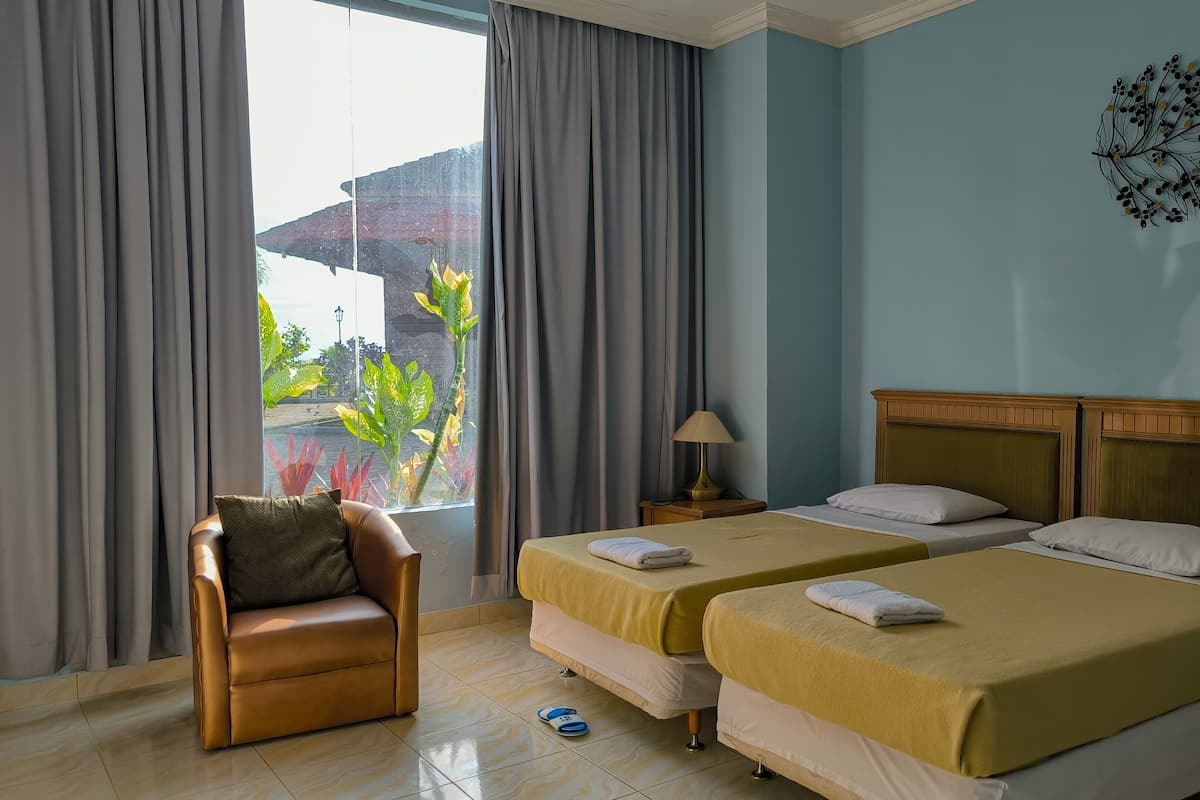 Deluxe Double Room, Non Smoking, Ocean View | 1 bedroom, desk, blackout drapes, iron/ironing board