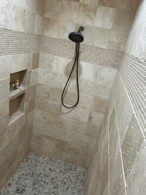 Shower, hair dryer, towels, soap