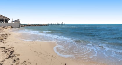 Renovated waterfront duplex with canal access, deck, water views & central AC