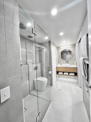 Shower, hair dryer, towels, soap