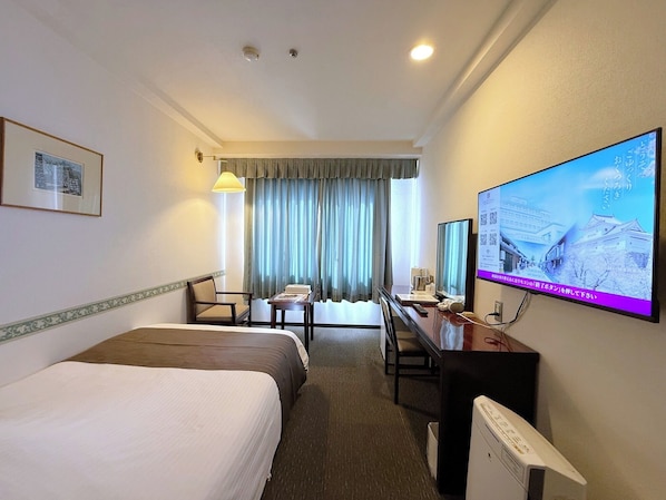 Desk, iron/ironing board, free WiFi, bed sheets