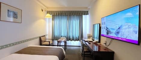 Desk, iron/ironing board, free WiFi, bed sheets