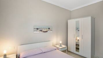 2 dormitorios, tabla de planchar con plancha, wifi gratis y ropa de cama