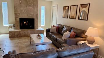 Smart TV, fireplace, books