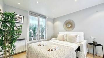 1 bedroom, desk, iron/ironing board, travel cot