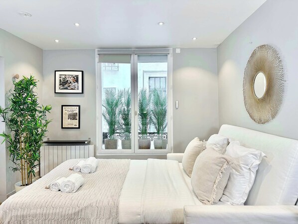 1 bedroom, desk, iron/ironing board, travel crib