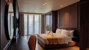 Minibar, coffres-forts dans les chambres, bureau, rideaux occultants