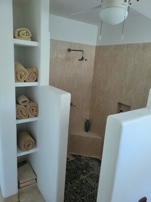 Shower, hair dryer, towels, soap