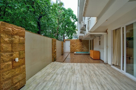 Premium Apartment, Patio, Pool View | Terrace/patio