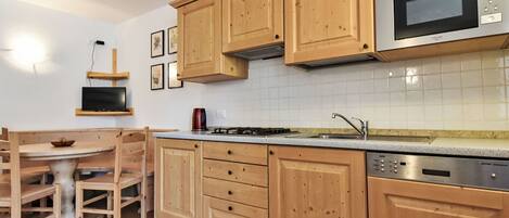 Microwave, dishwasher, toaster, dining tables
