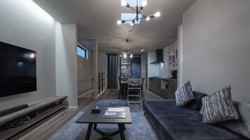 Luxury Villa, Patio | Living area | 60-inch flat-screen TV with satellite channels, Netflix, Hulu