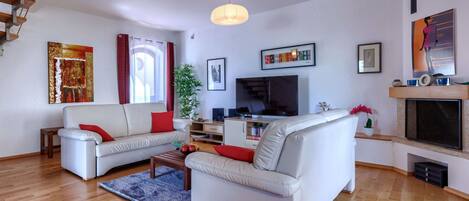 Couch, Picture Frame, Property, Furniture, Comfort, Orange, Lighting, Interior Design, Studio Couch