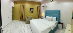 Deluxe Room, Balcony, City View | Desk, laptop workspace, free WiFi