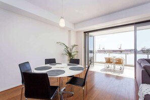 Dining - “Enjoy Fremantle from this spacious 3BR apartment with port views, communal pool & free parking — walk to Rottnest Ferry & Markets.” (Fremantle)