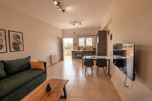 Comfort Apartment | Living area | TV