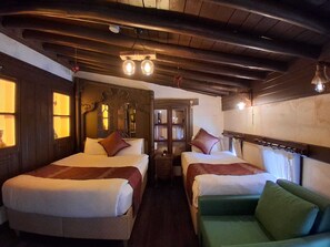 Deluxe Triple Room, City View | Desk, laptop workspace, soundproofing, free WiFi