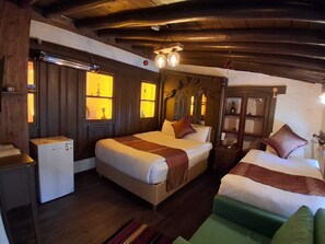Deluxe Triple Room, City View | Desk, laptop workspace, soundproofing, free WiFi