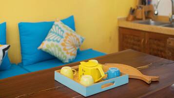 Fridge, microwave, electric kettle, high chair