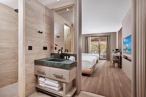 Regadera, amenidades de baño gratuitas, secadora de cabello, toallas