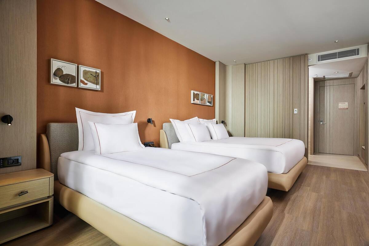 Basic Room, Multiple Beds, Garden View | 1 bedroom, free minibar, desk, laptop workspace