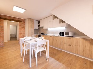 Microwave, oven, dining tables