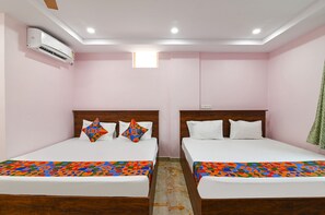 Egyptian cotton sheets, premium bedding, in-room safe, free WiFi - FabHotel Chandu’s (Tirupati)